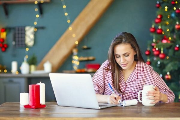 Student working from home in a temporary freelance christmas job